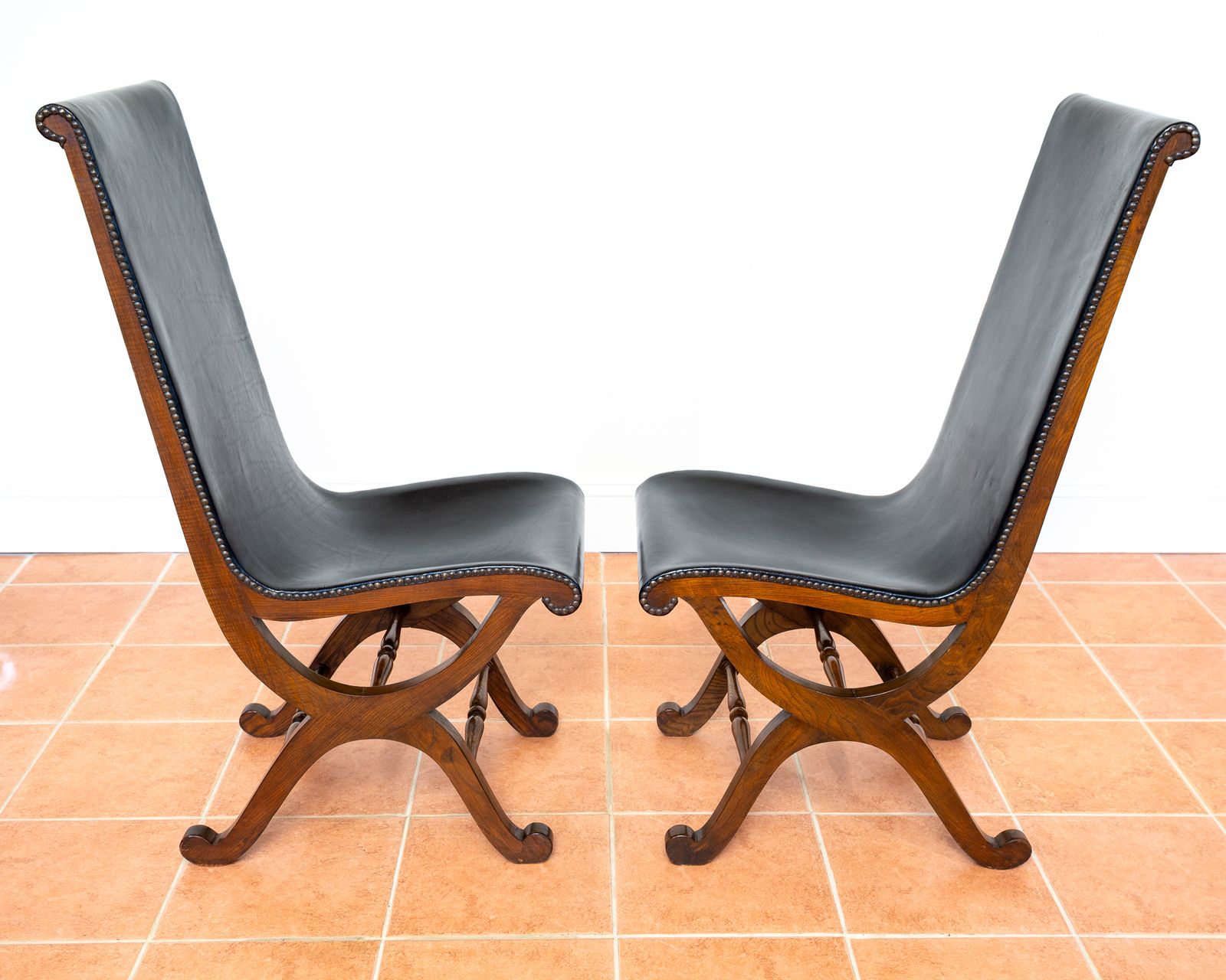 photo vintage 6 Spanish Oak Leather Dining Chairs By Pierre Lottier Valmazan Mid Century Neoclassical Colonial 1960s Black Leather Sling Seat Studded Leather