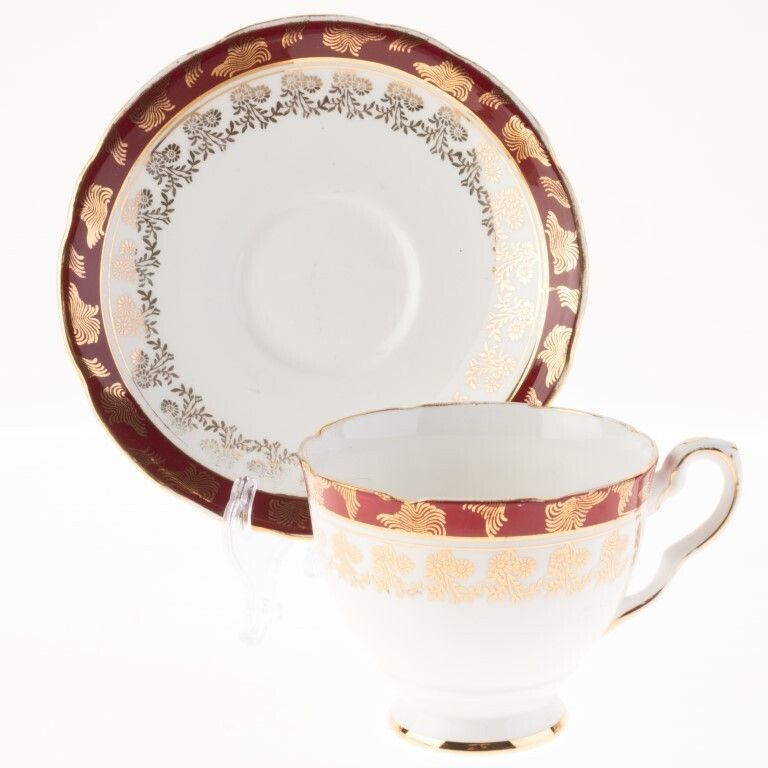 Royal Stafford Gilt Porcelain Teacup With Saucer
