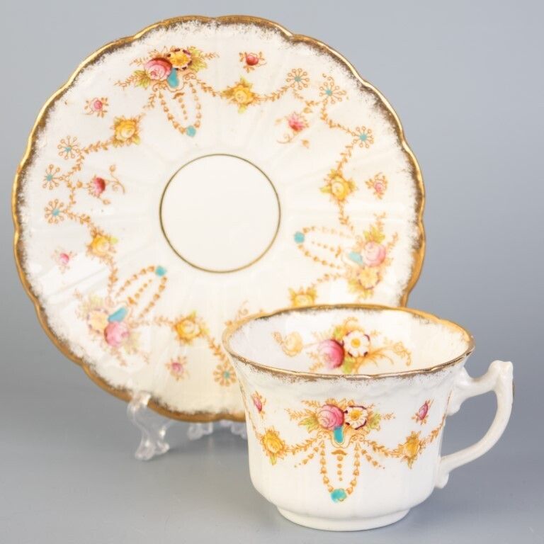 Antique Art Nouveau Bow Porcelain Ceramic Teacup & Saucer