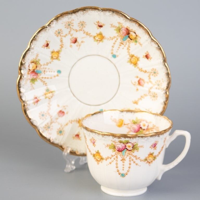 Antique Art Nouveau Bow Porcelain Ceramic Teacup & Saucer