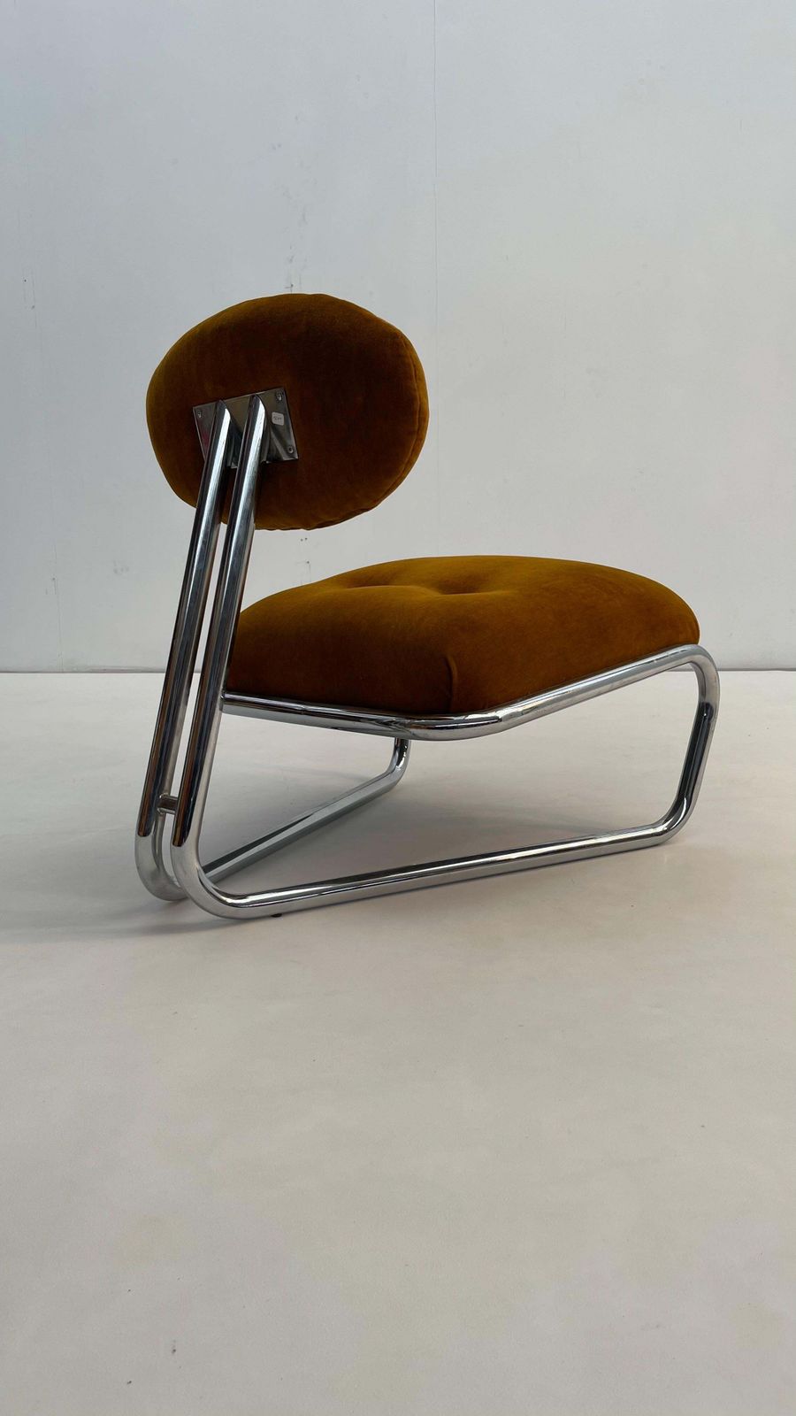 photo furniture Little Tubular Lounge Chair In Rusty Orange Velvet