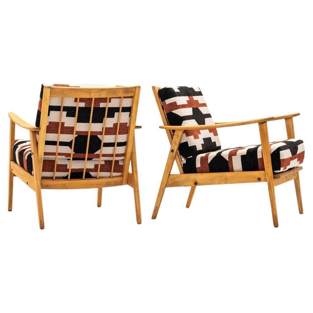 Pair Of Armchairs In Bold Geometric Reupholstery