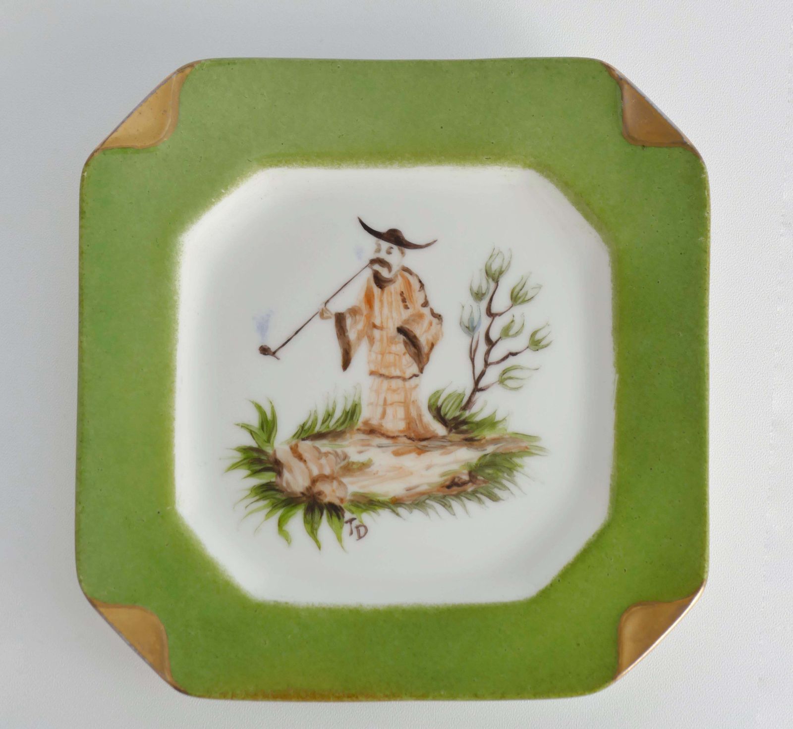 Handpainted Green And Gold Porcelain Ashtray With Chinoiserie Smoking Motif photo for sale