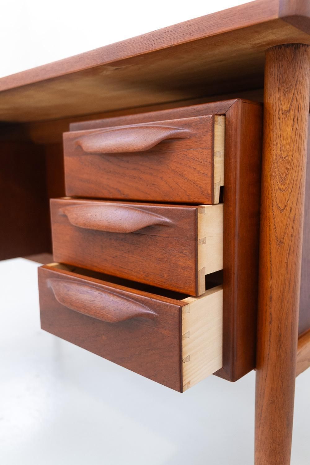 photo furniture Danish Mid Century Modern Asymmetrical Teak Desk, 1950s.