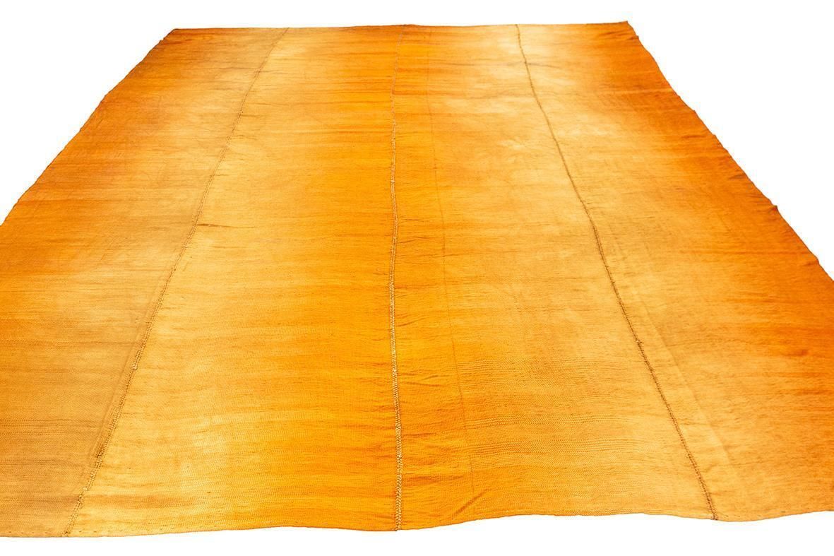 Kilim Rug In Soft Golden Hue photo furniture