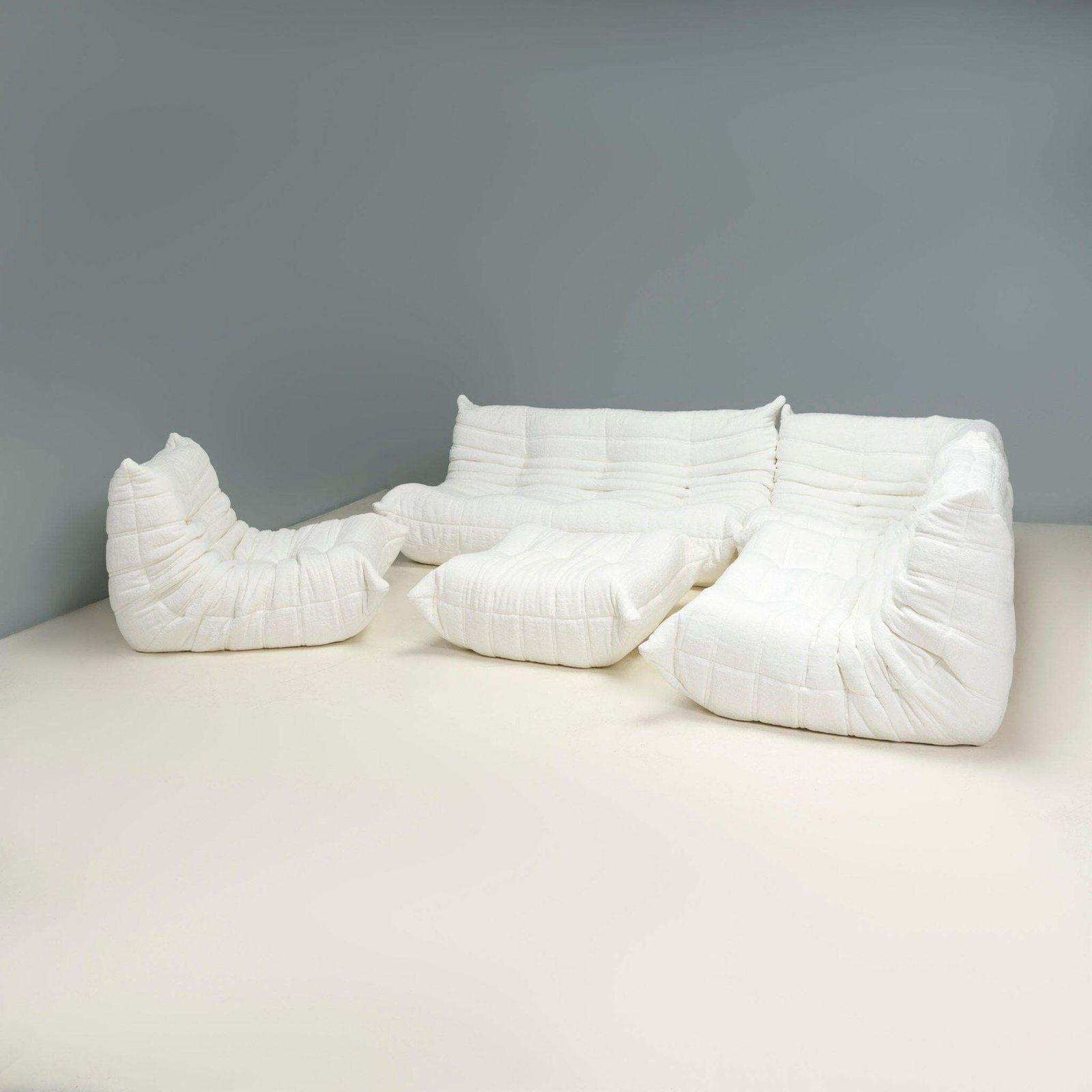 photo furniture Ligne Roset By Michel Ducaroy White Bouclé Togo Sofa And Footstool, Set Of Five