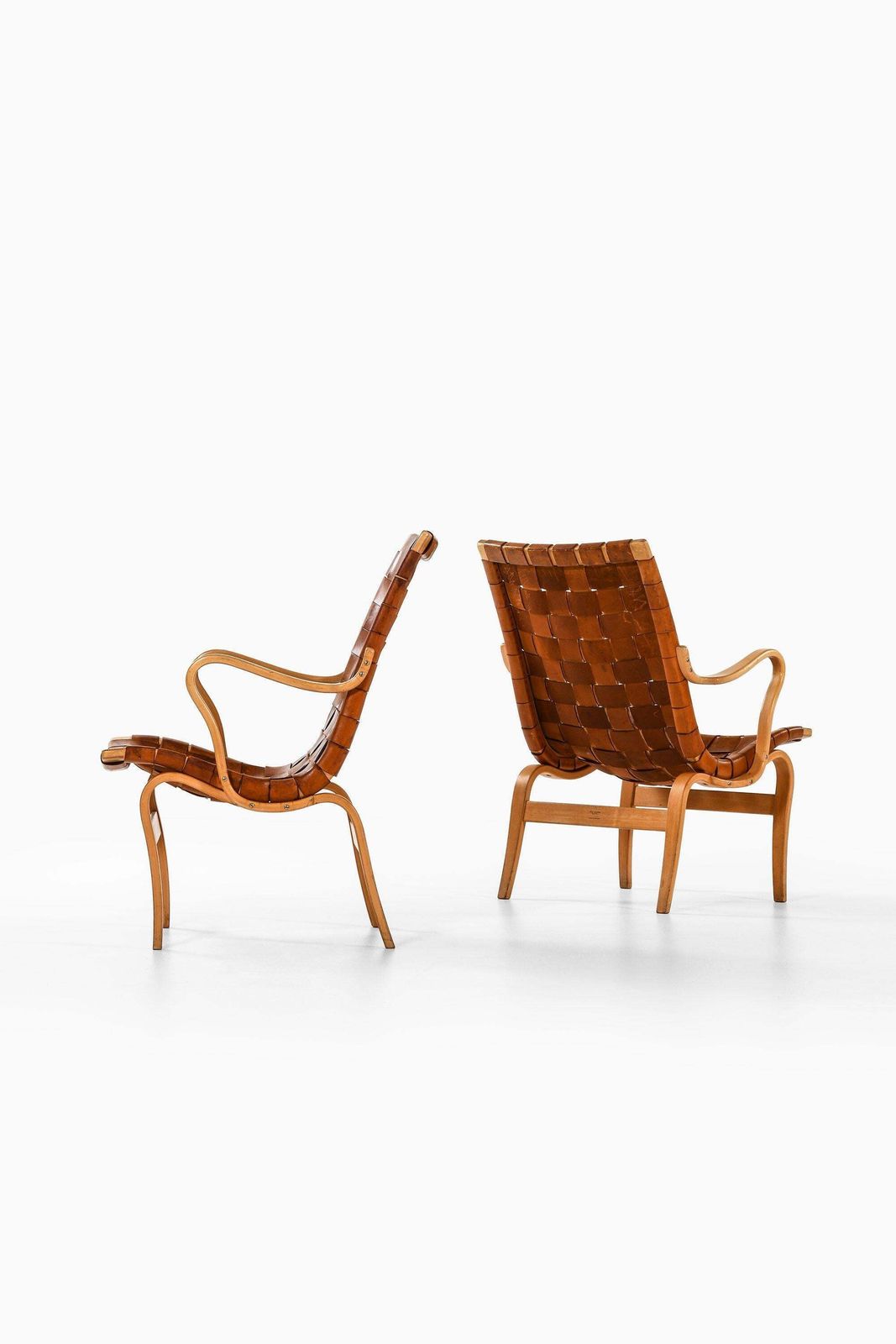 Pair Of Easy Chairs In Birch & Original Leather Webbing By Bruno Mathsson, 1968 photo for sale