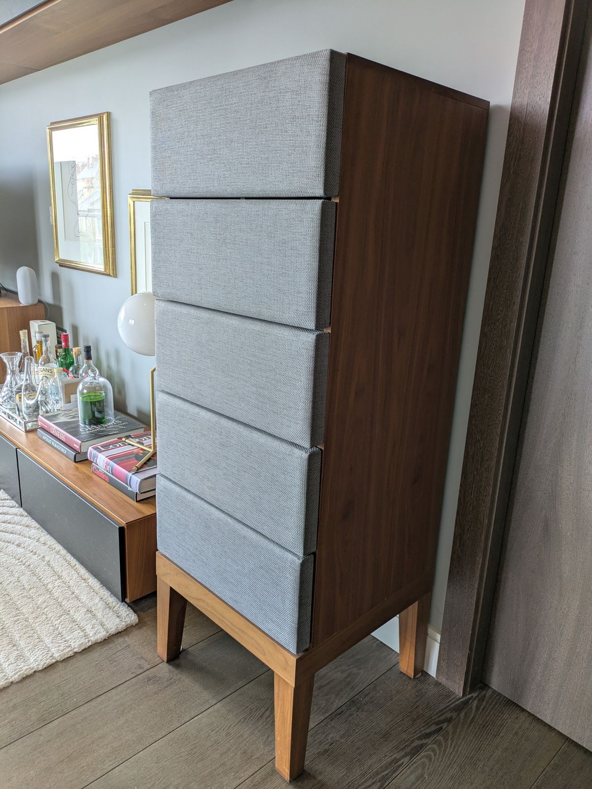 Tall Chest Of Drawers In Walnut And Upholstered Grey Fabric