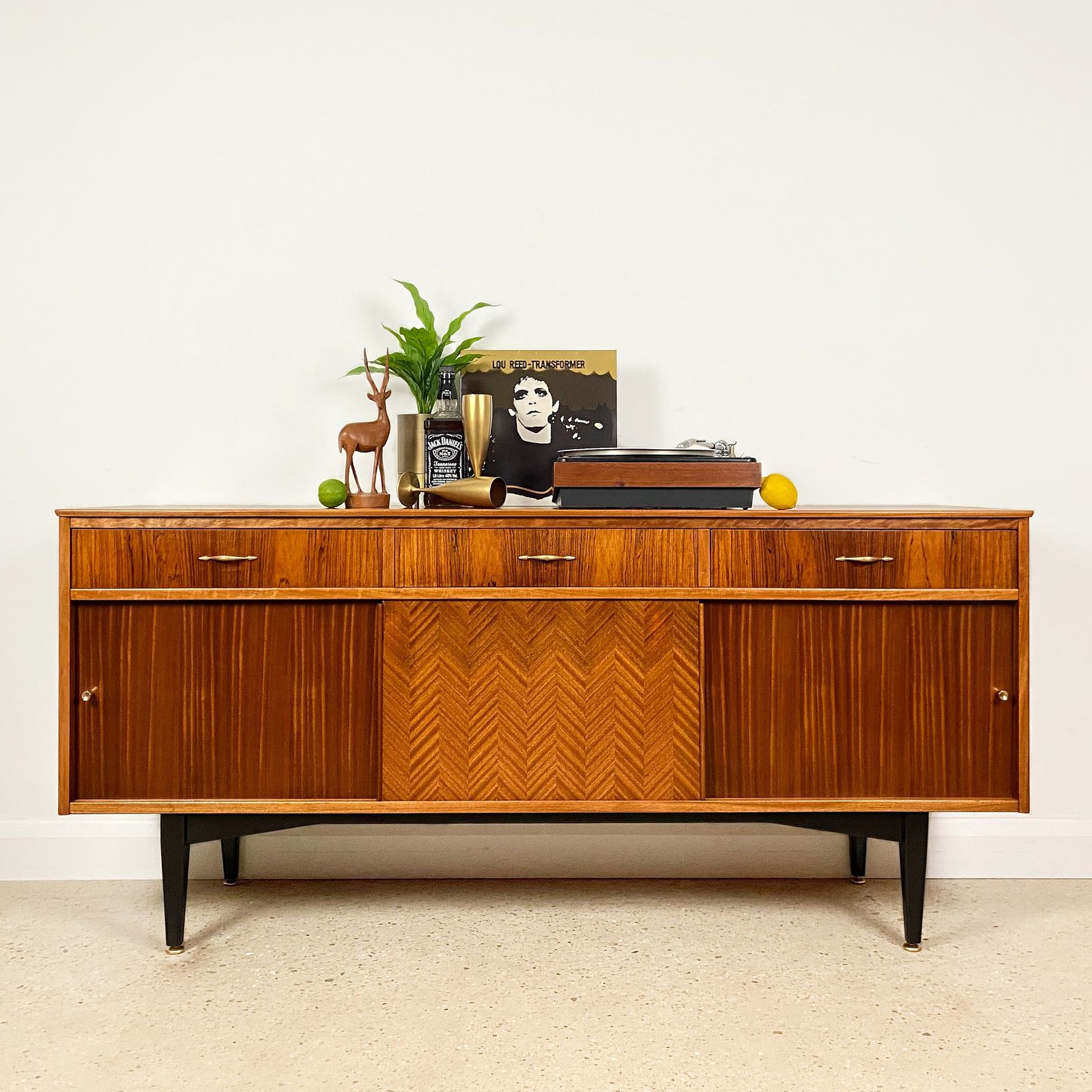 photo furniture Mid Century Sideboard By Jentique In Teak Rosewood Tola With Black And Gold Chevron Design And Light