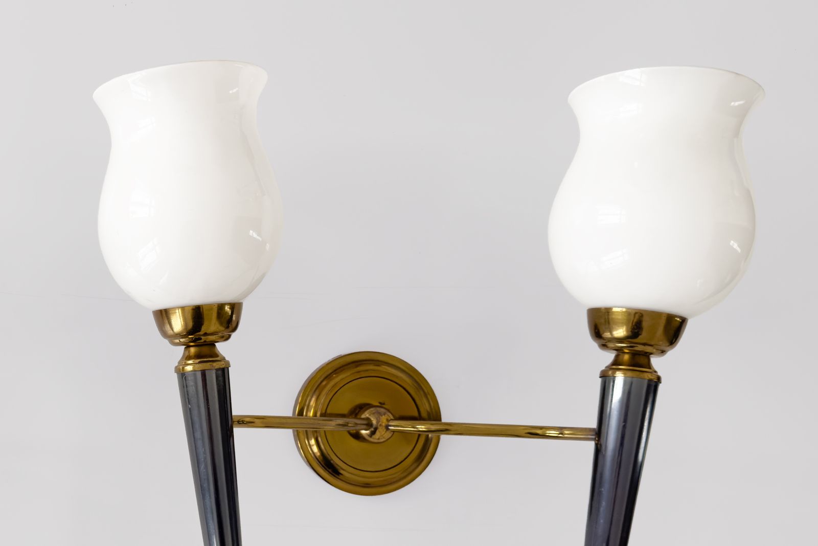 Attributed To The House Of Jansen, Pair Of Two Light Sconces In Gilded & Blue Toned Metal With Opaline Shades. photo for sale