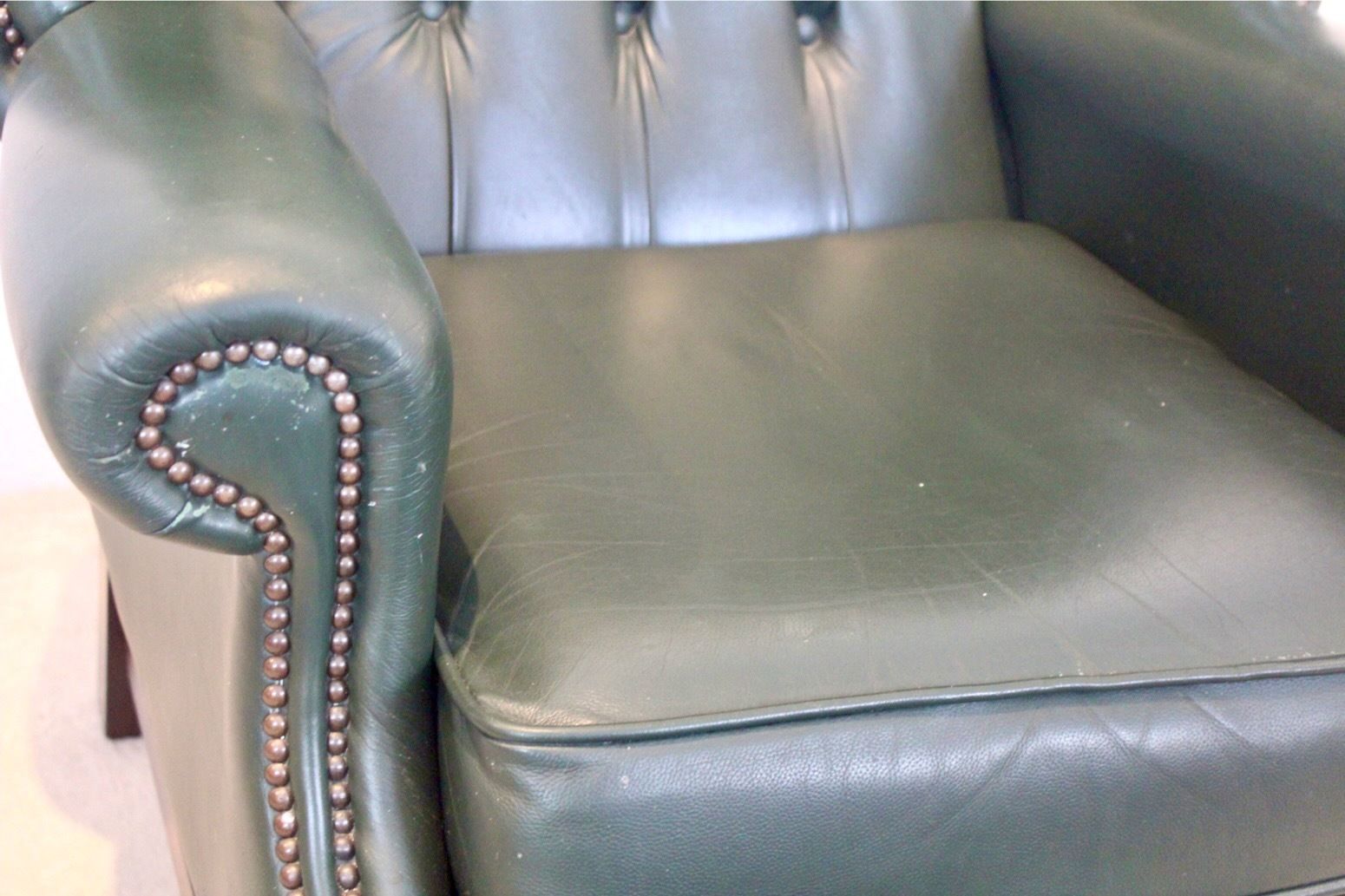Classic Chesterfield Wingback Armchair With Footstool In Green Leather photo for sale