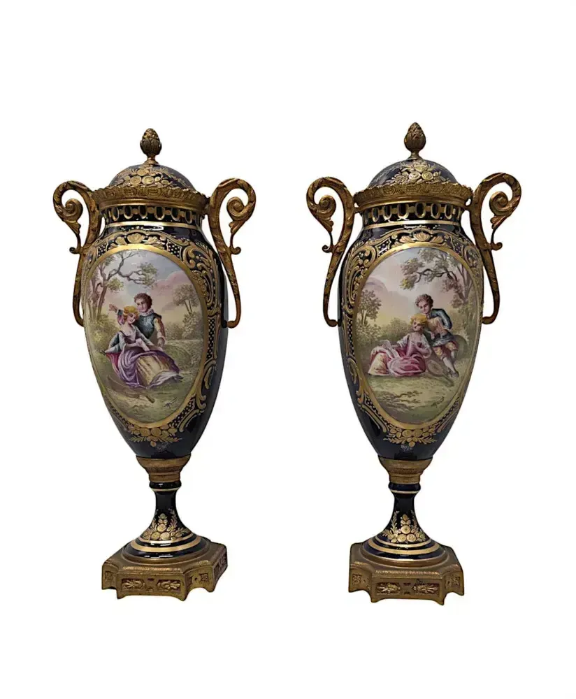 A Very Fine Pair Of 19th Century Hand Painted Sevres Style Lidded Urns