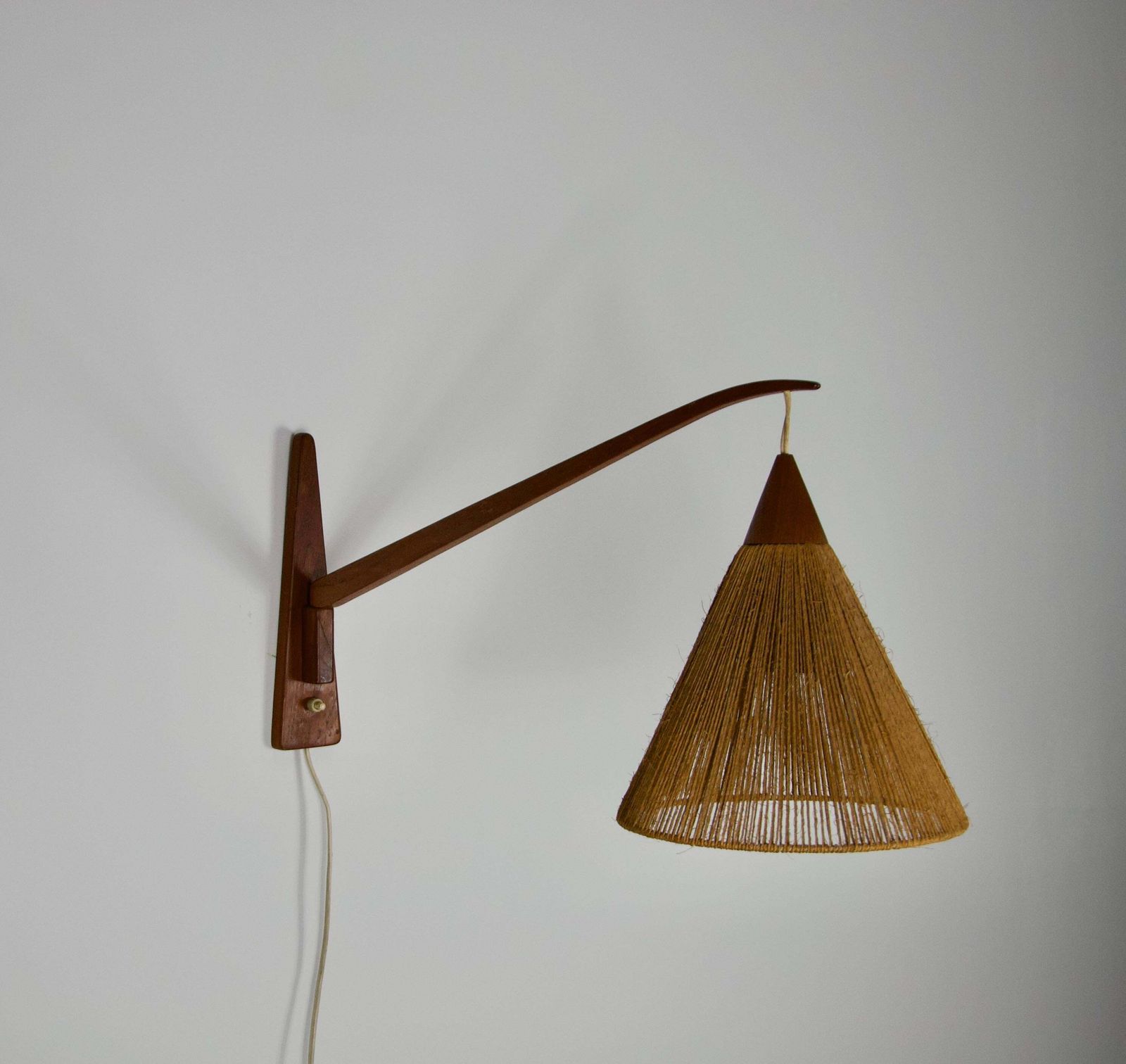 Mid Century Teak And Rattan Swing Arm Wall Lamp By Temde, Swiss, 1960s photo for sale
