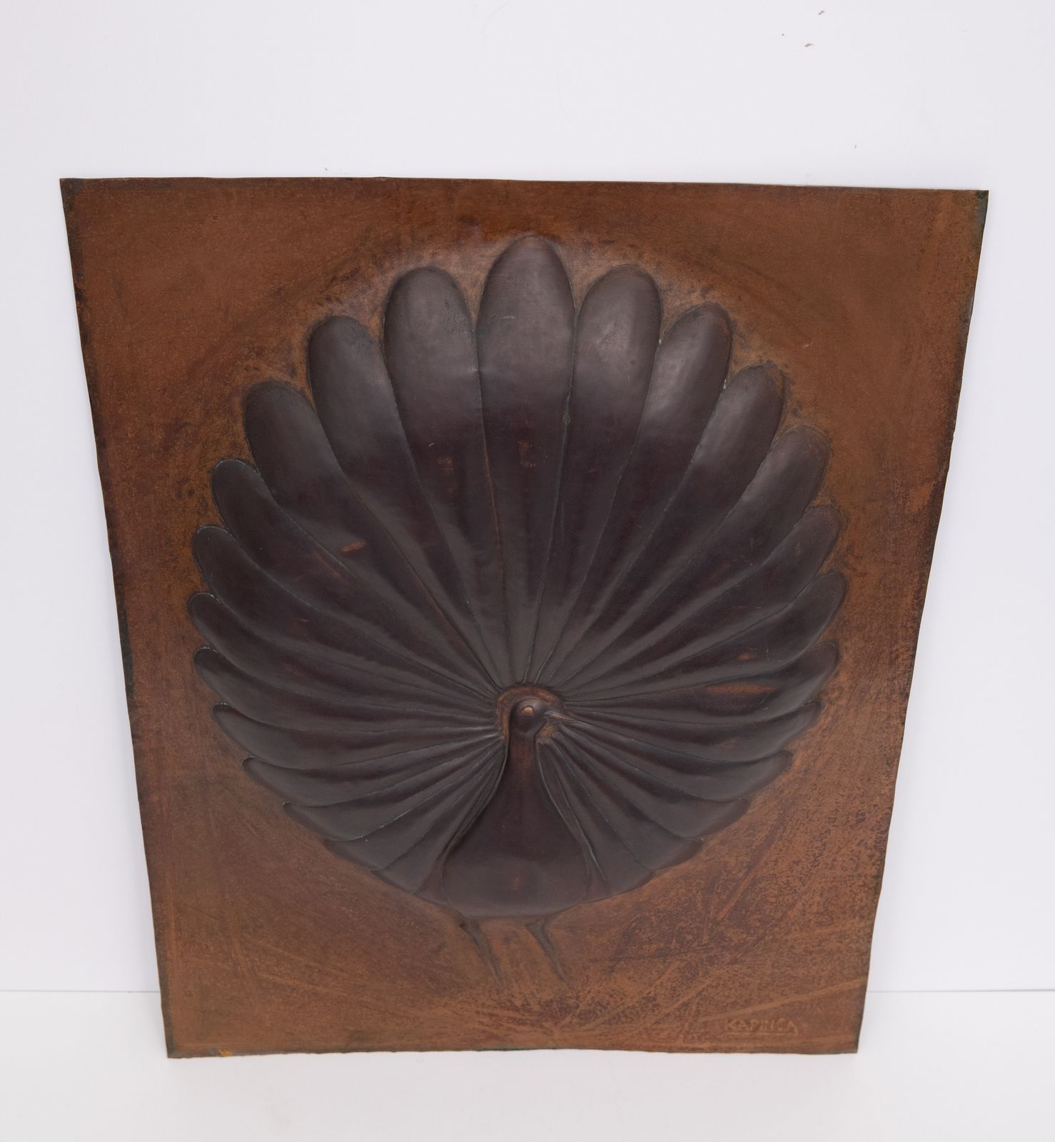 Handmade Peacock Hammered Into A Sheet Of Copper .African 1970s photo vintage