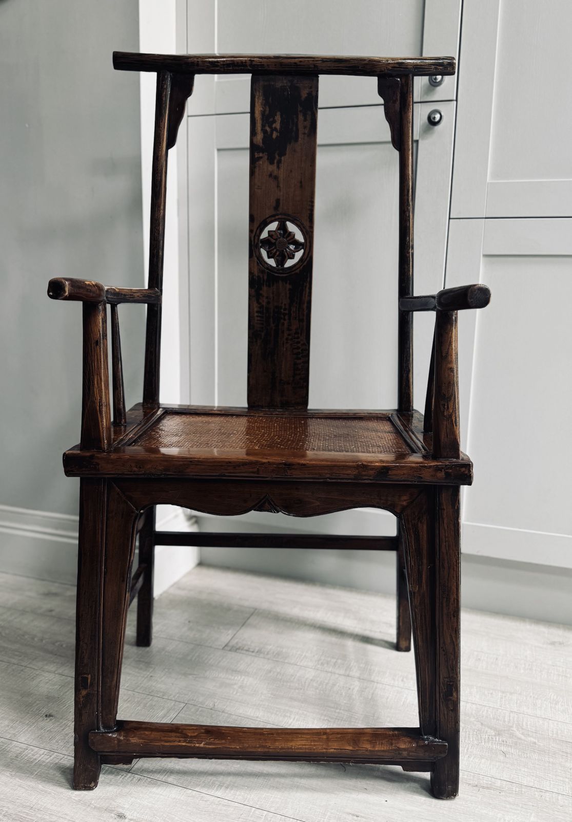 19th/20th Century Chinese Elm Chair With A Carved Pierced Splat And Caned Seat