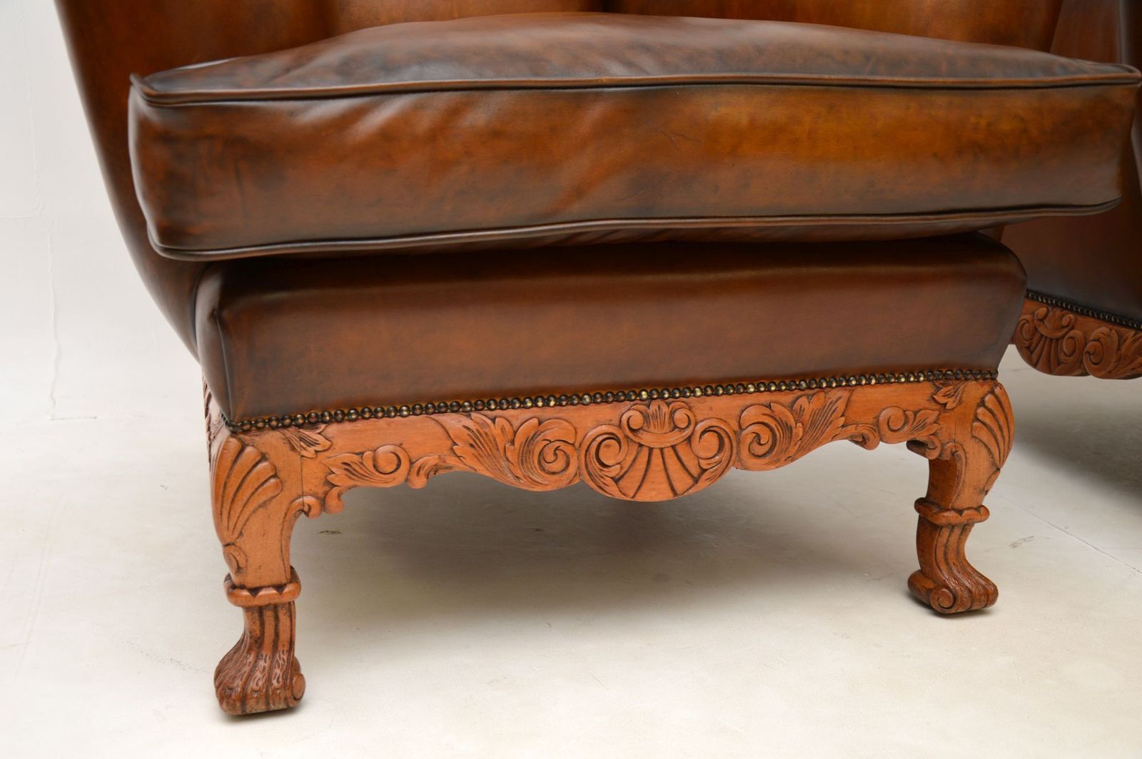 Pair Of Antique Leather Wing Back Armchairs photo vinterior