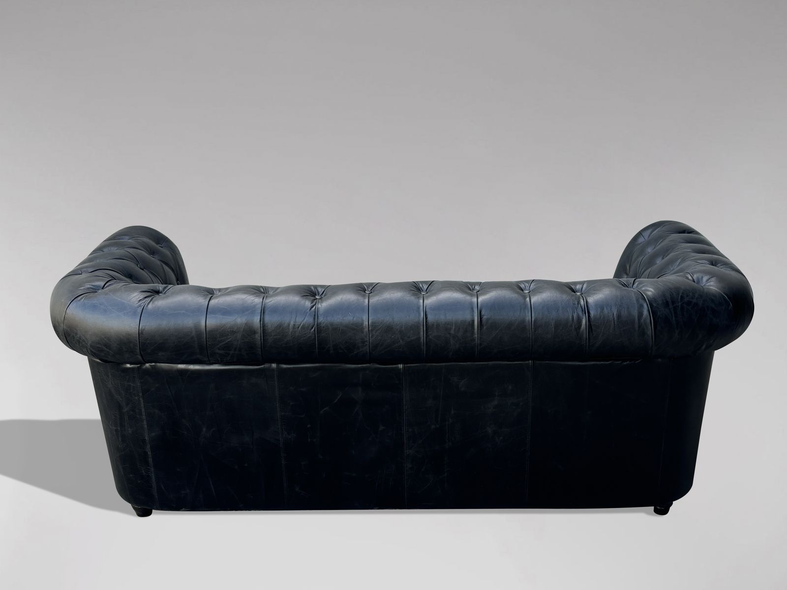 Three Seater Black Leather Chesterfield Sofa photo vinterior