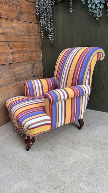 Traditionally Upholstered Country House Lounge Armchair With Brass Castors photo for sale