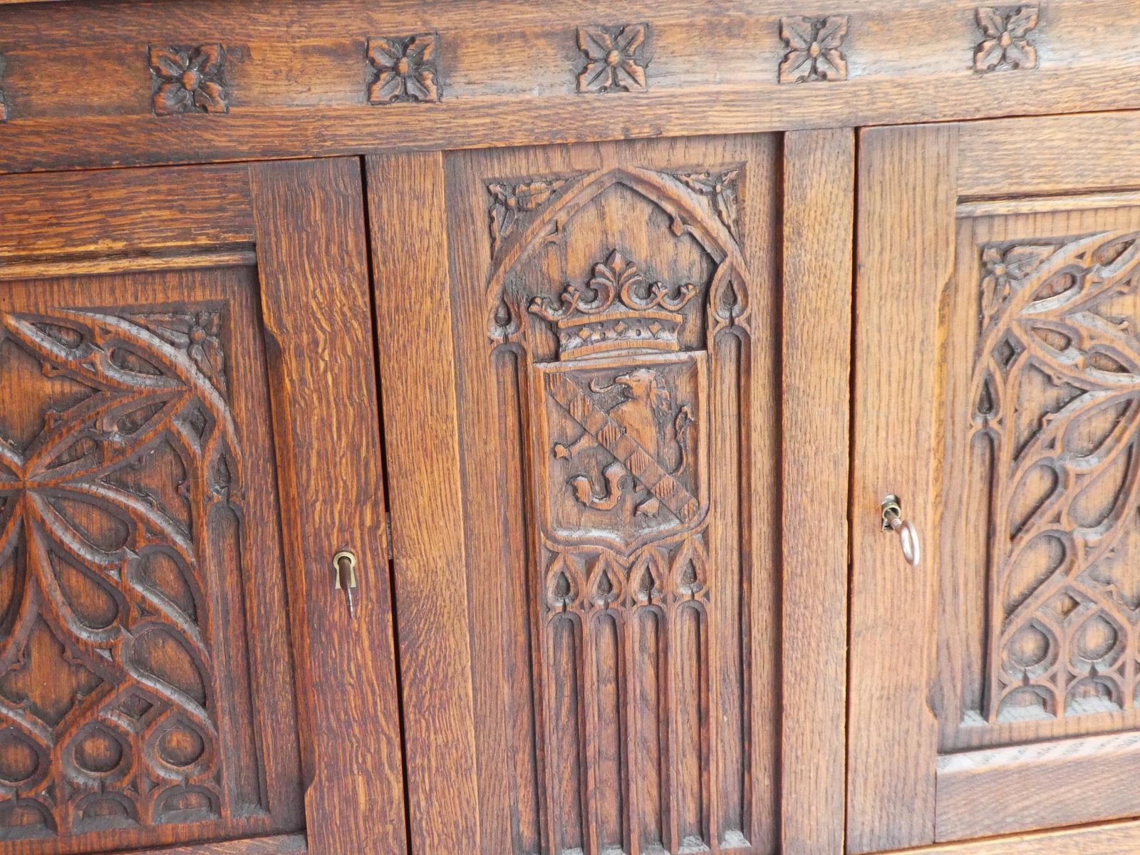 Antique Gothic Wooden Credenza, Hand Carved Cabinet With Doors And Lock, 19th Century Medieval Cupboard With Lion And Church Window Panels photo Furniture
