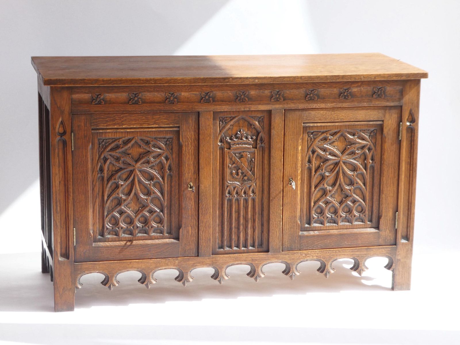 Antique Gothic Wooden Credenza, Hand Carved Cabinet With Doors And Lock, 19th Century Medieval Cupboard With Lion And Church Window Panels photo buy