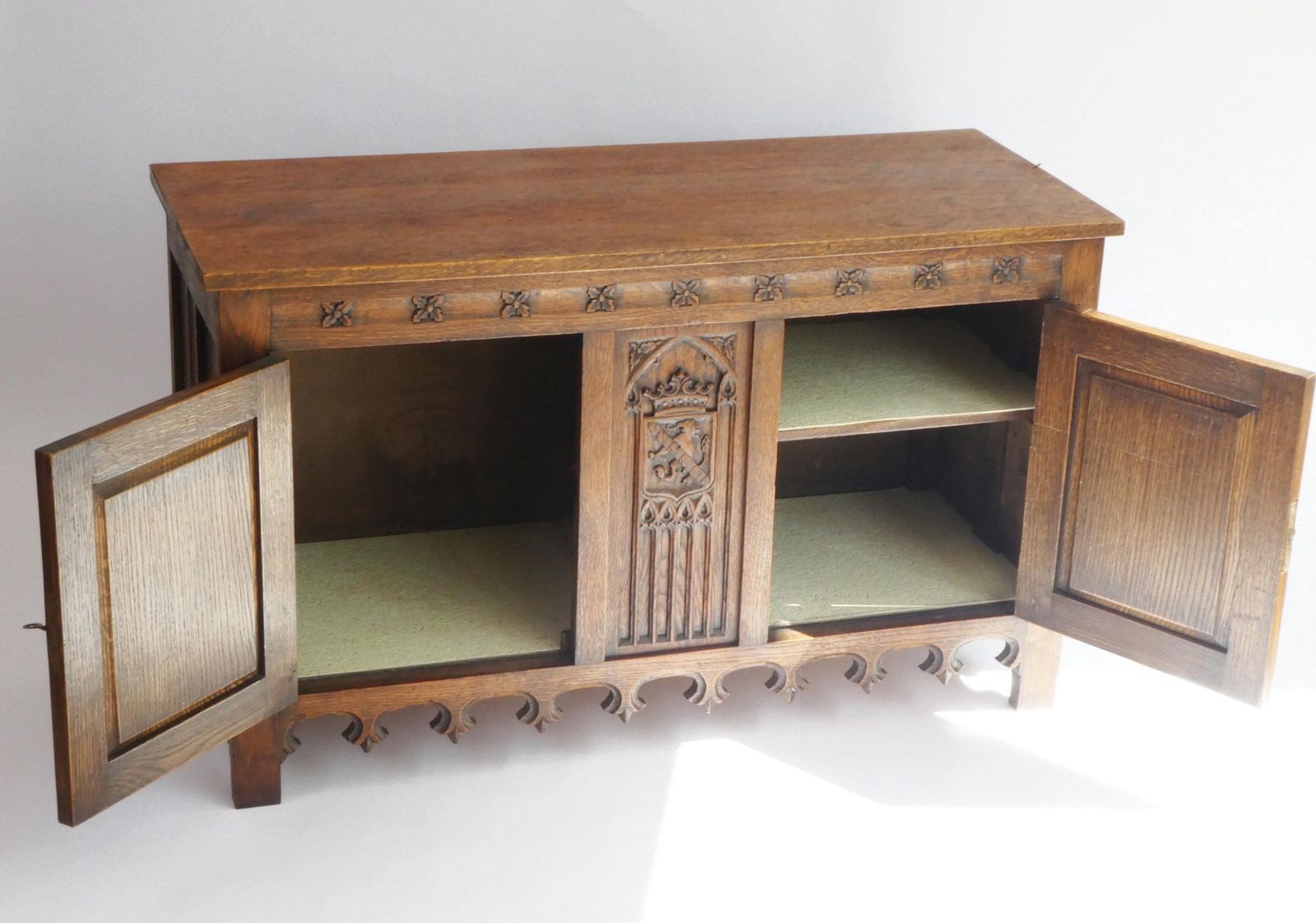 Antique Gothic Wooden Credenza, Hand Carved Cabinet With Doors And Lock, 19th Century Medieval Cupboard With Lion And Church Window Panels photo vintage