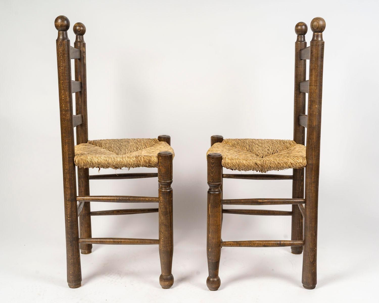 photo buy Set Of Six Charles Dudouyt Dining Chairs In Wood And Cane, 20th Century.