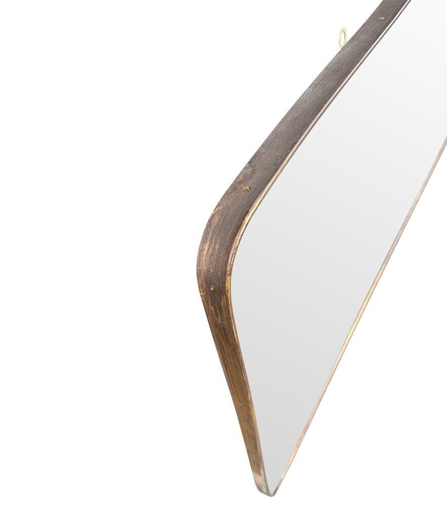 photo vinterior A Large Orignal 1950s Italian Brass Framed Landscape Mirror With Curved Corners