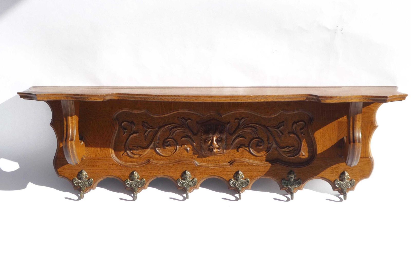 Antique Carved Wood Wall Shelf With Brass Angel Hooks, Oak Coat Rack With Lions Head, French Rustic Decor photo for sale