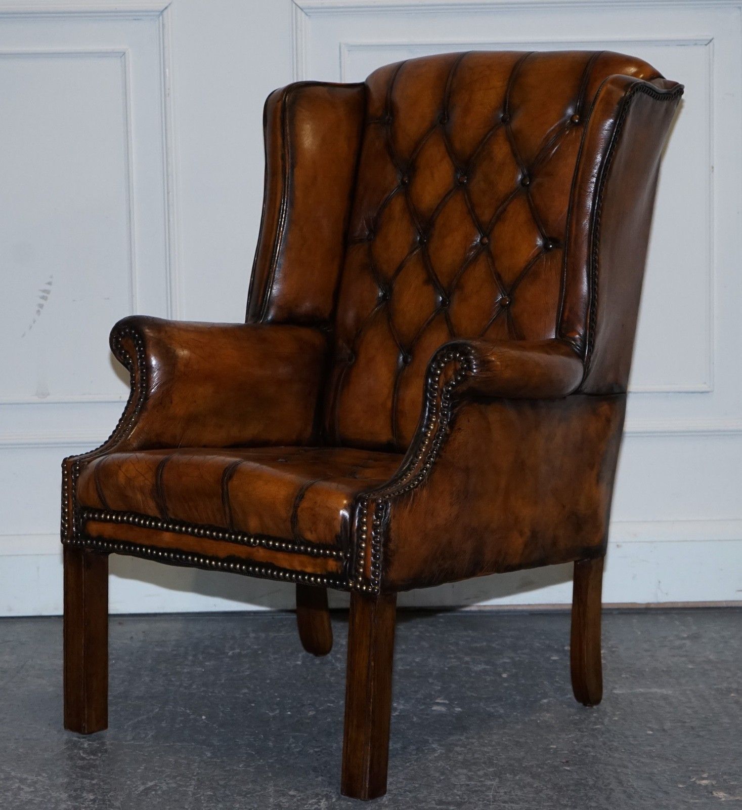 photo vintage Stunning 1960's Hand Dyed Brown Leather Chesterfield Wingback Armchairs