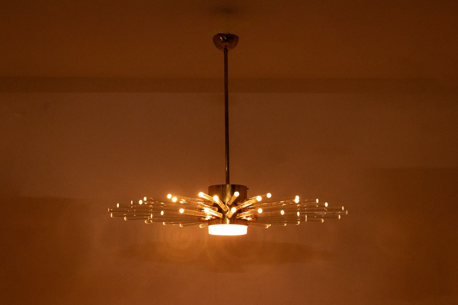 photo vintage Radiant Glass Tube Chandelier. Contemporary Design.