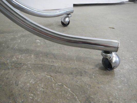 photo furniture Coffee Table With Wheels And Smoked Glass, 1960