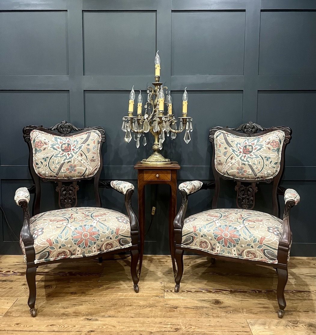 A Pair Of English Victorian Open Sided Armchairs