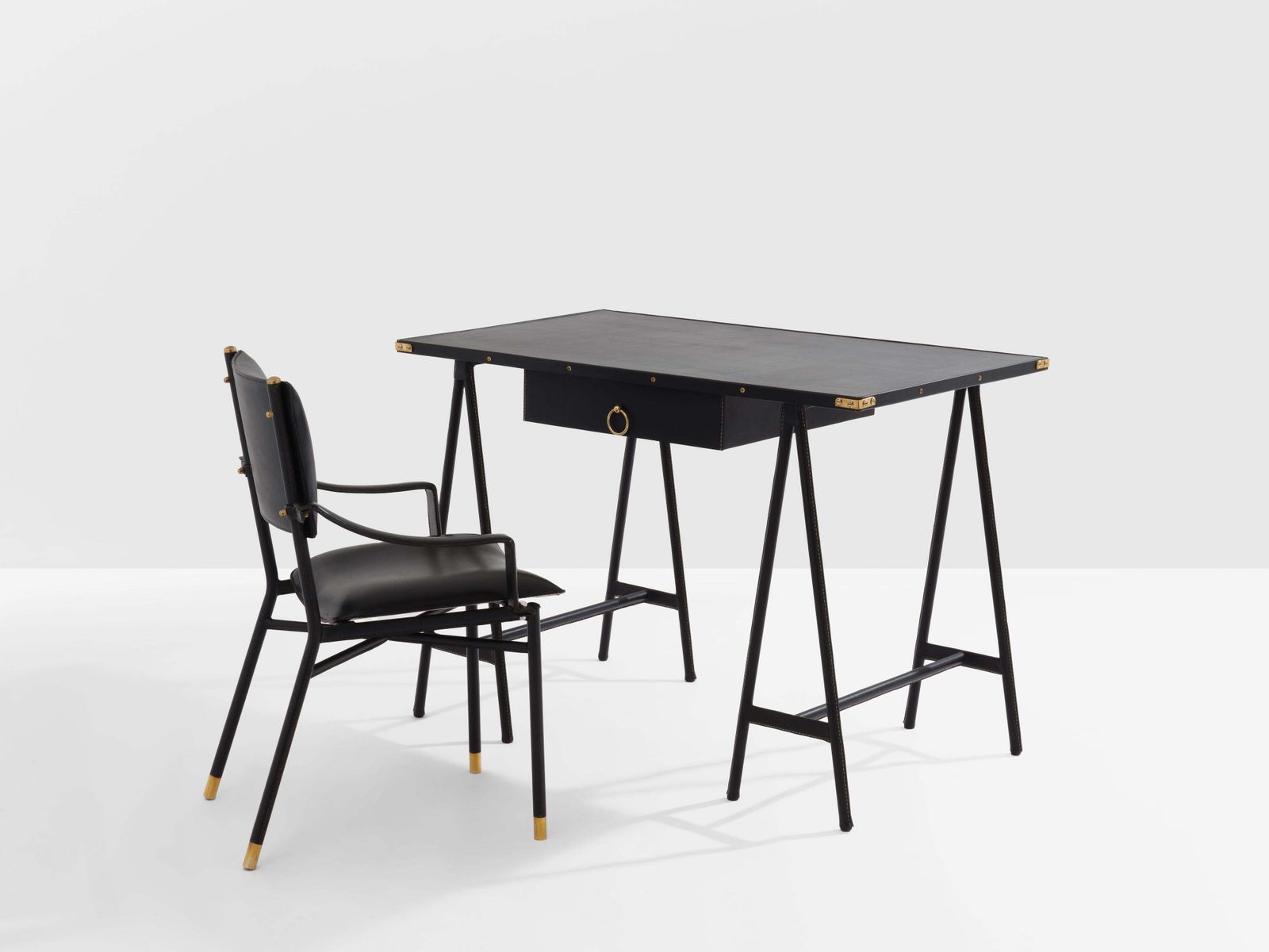 photo vinterior Fauteuil de bureau Jacques Adnet en cuir sellier laiton, 1950
