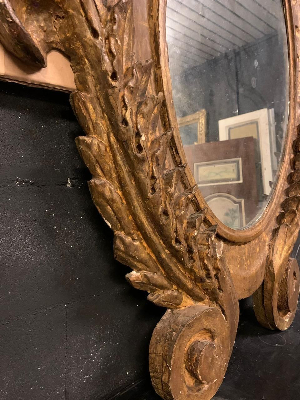 Oval Wall Mirror In Carved And Gilded Wood, Italy photo for sale