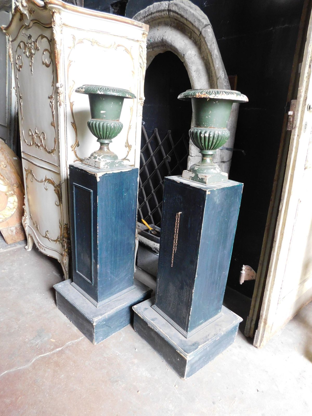 Pair Of Wooden Pillars With Attached Cast Iron Vases, Italy photo furniture