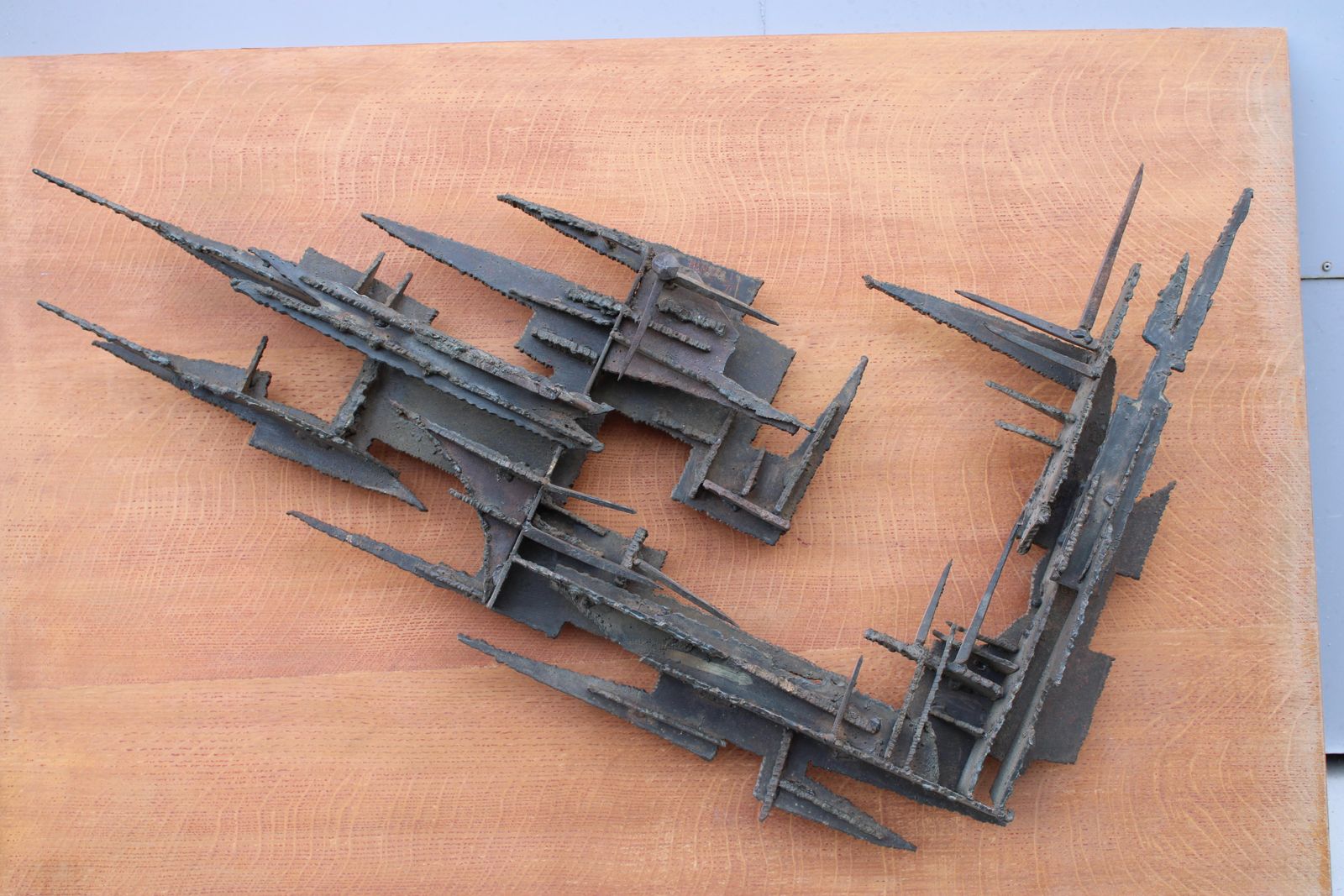 photo furniture Brutalist Wall Sculpture  Forged Iron 1971 Italy Wooden Panel