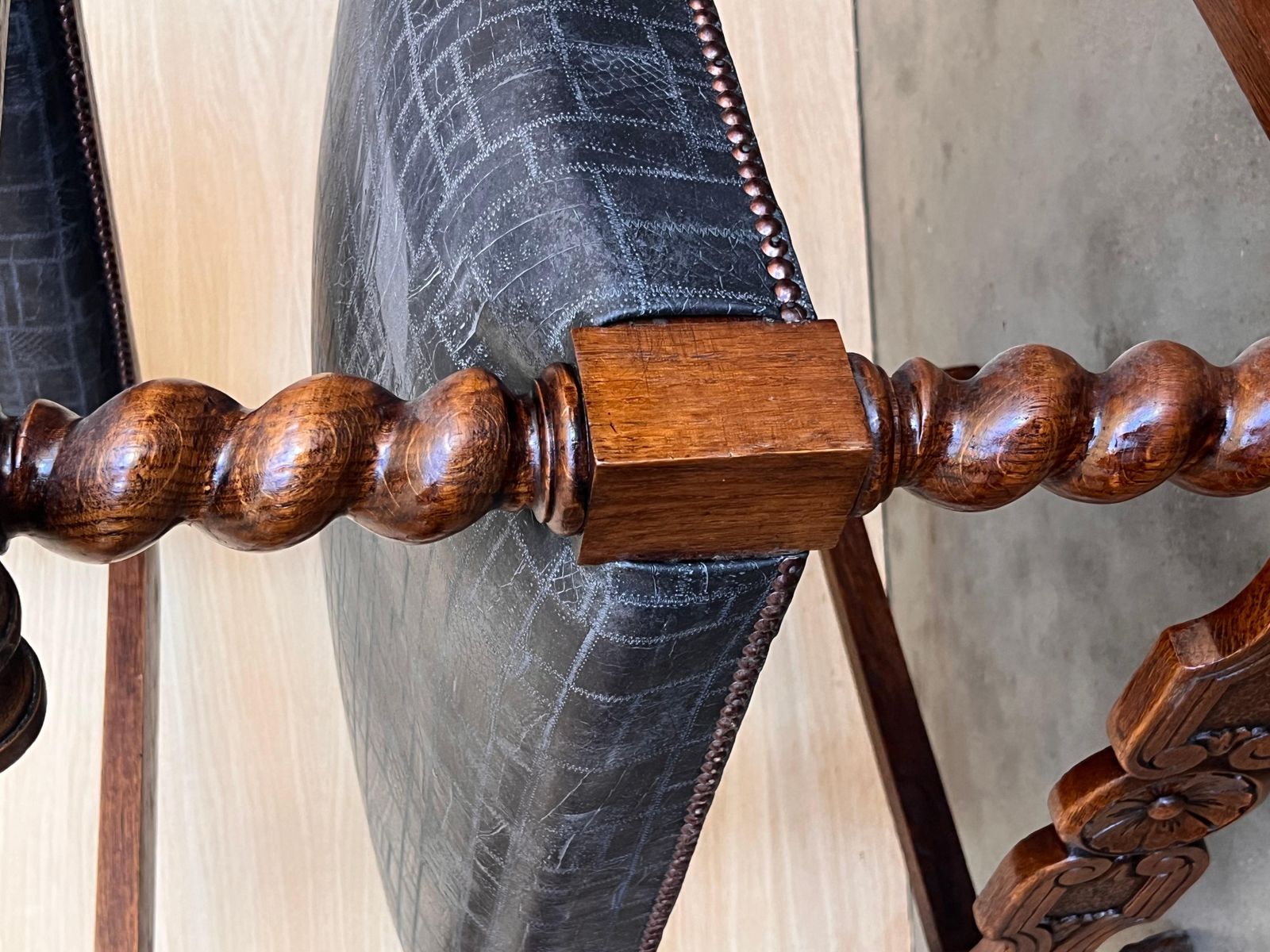 photo for sale 19th Spanish Carved Walnut Armchair With New Black Leather And Solomonic Columns