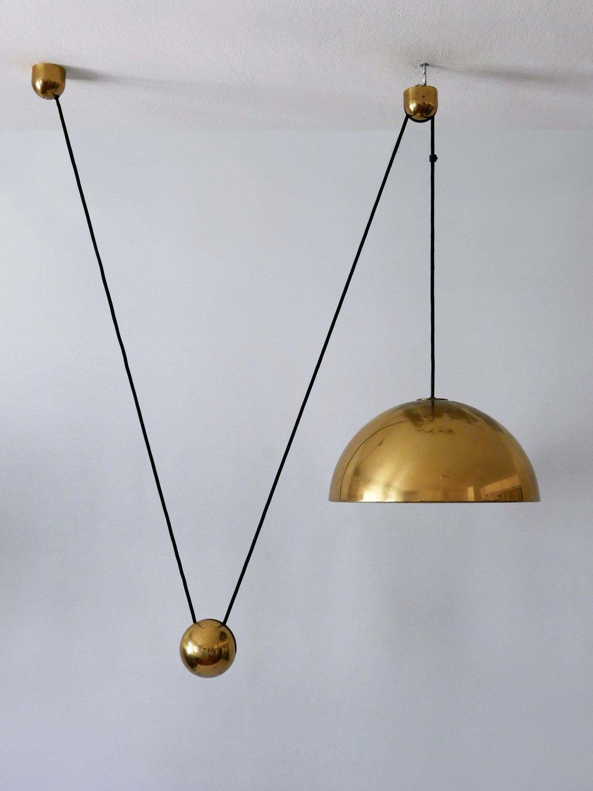 Elegant Mid Century Counterweight Brass Pendant Lamp By Florian Schulz 1960s photo vinterior