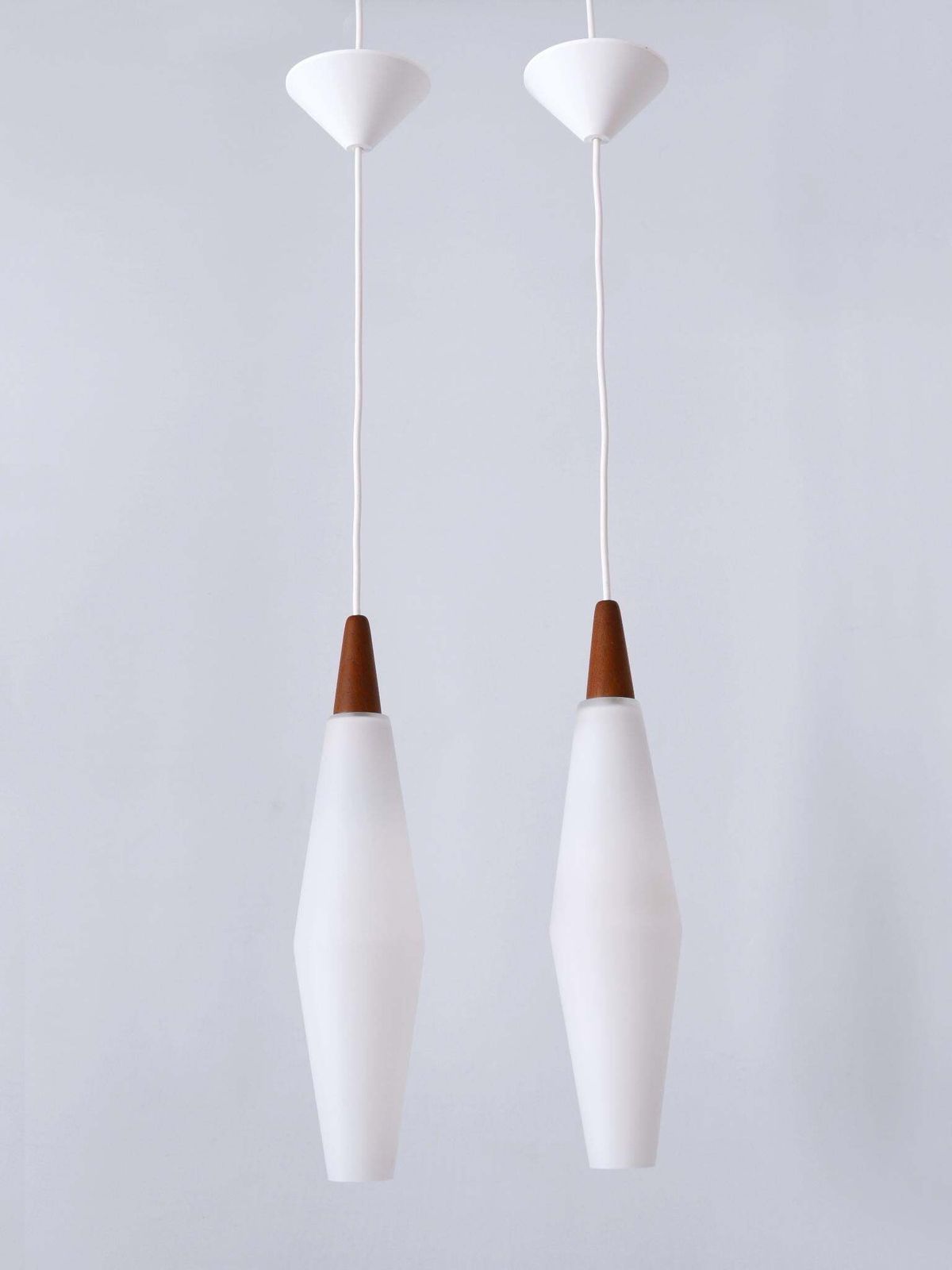 Lighting Set Of Two Elegant Scandinavian Opaline Glass & Teak Pendant Lamps 1960s photo