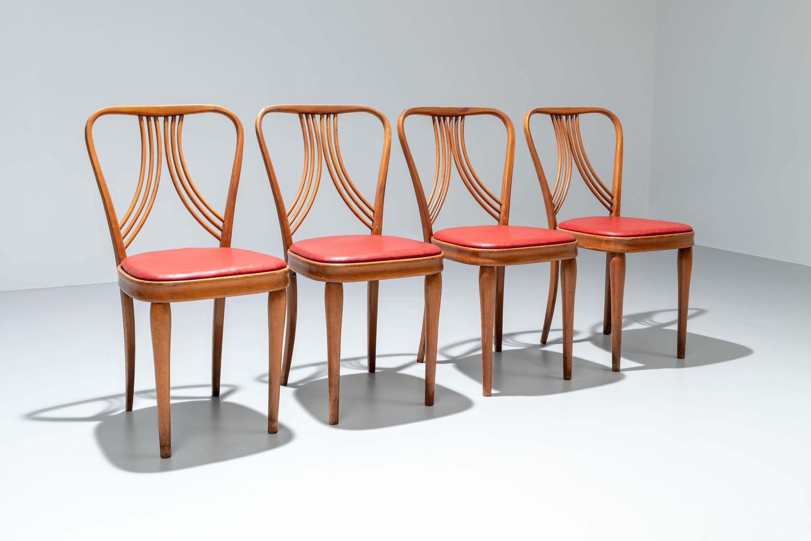 Set Of 4 Diningroom Chairs In Blond Wood And Red Faux Leather, Italy, 1950's photo for sale