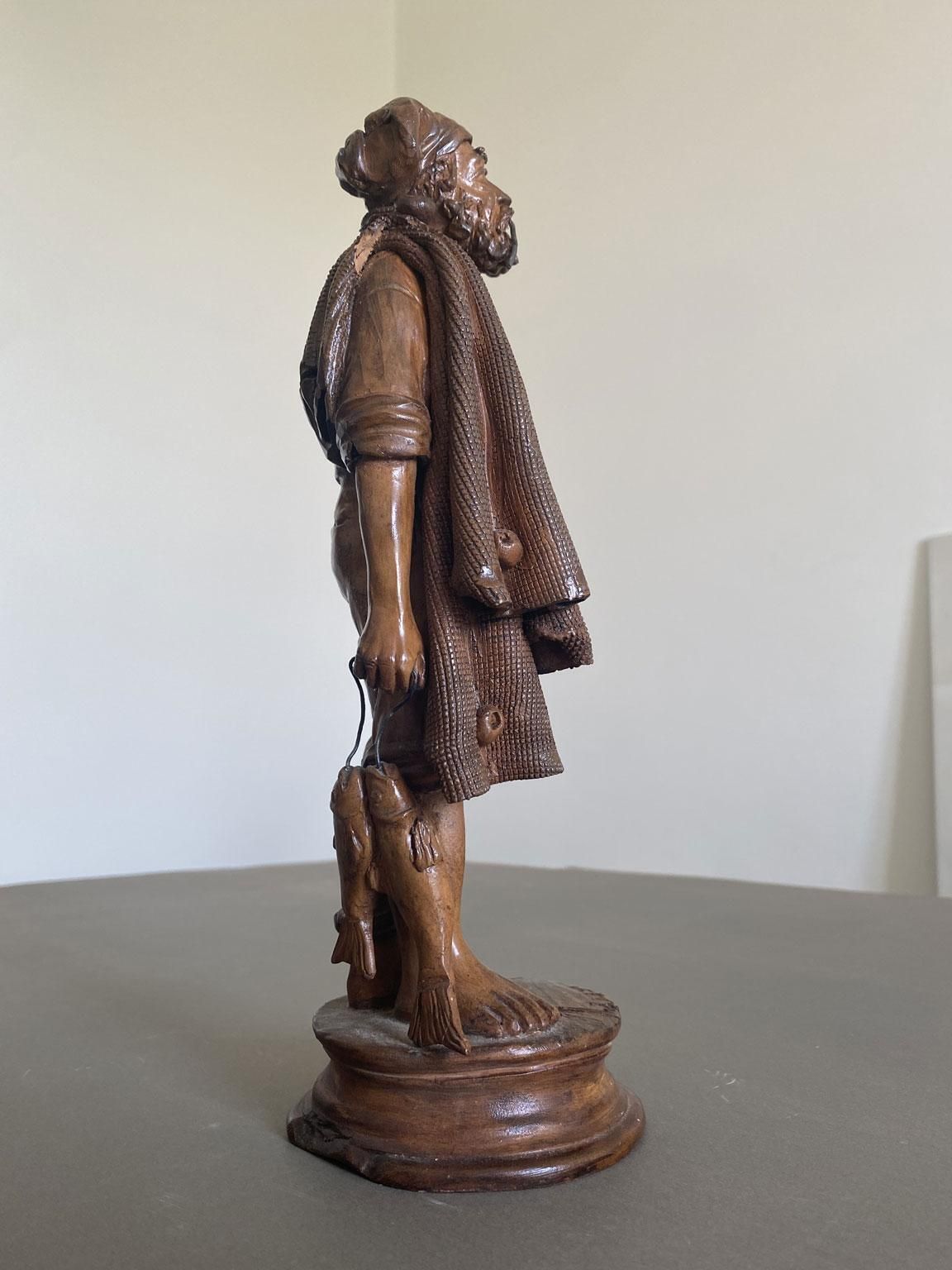 photo furniture Italy Late 20th Century Carved Wooden Fisherman Sculpture