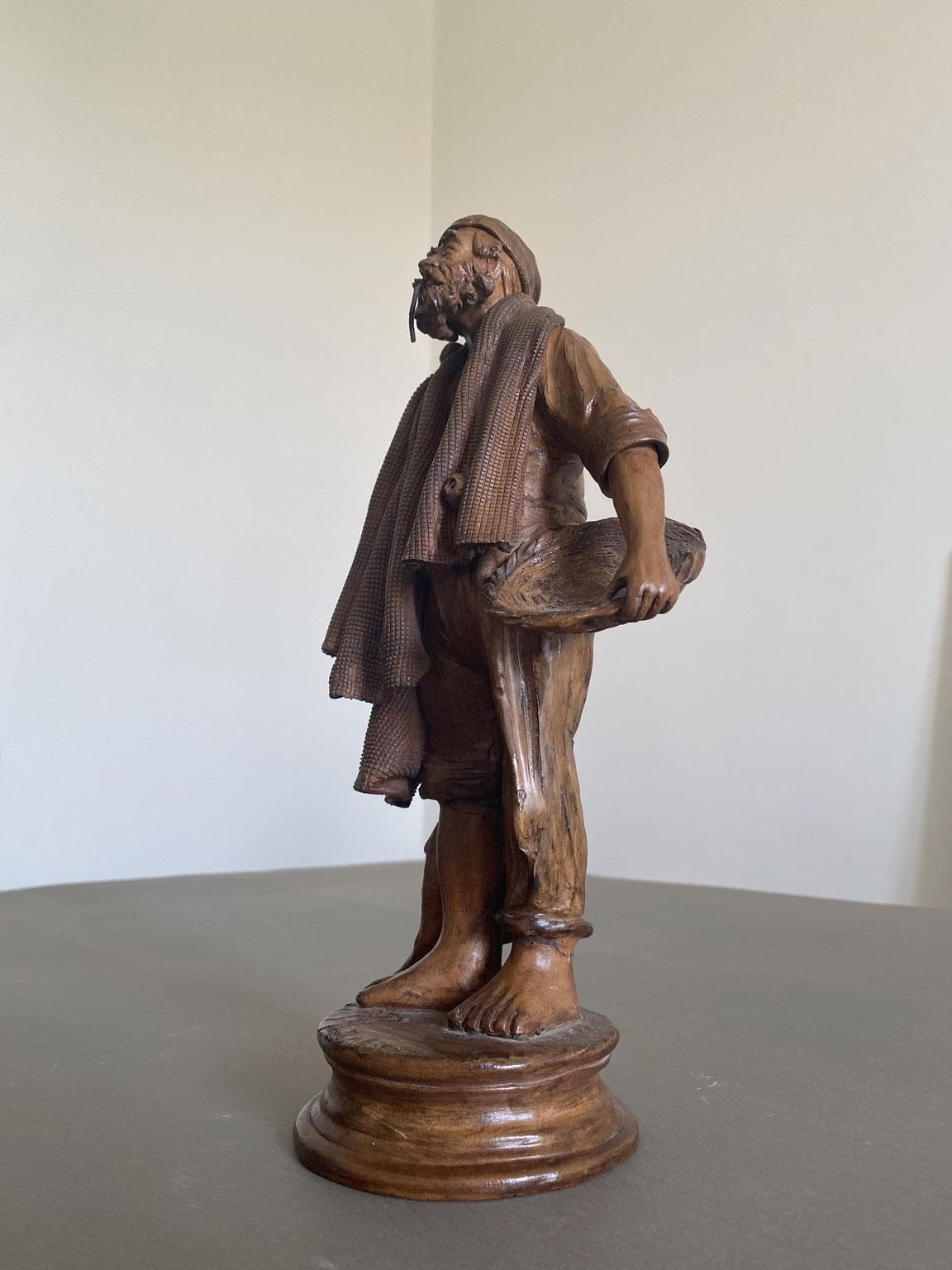 photo buy Italy Late 20th Century Carved Wooden Fisherman Sculpture