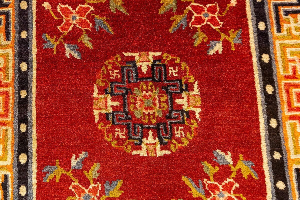 Tibetan Rug Red Field Spiritual Symbolism photo vinterior