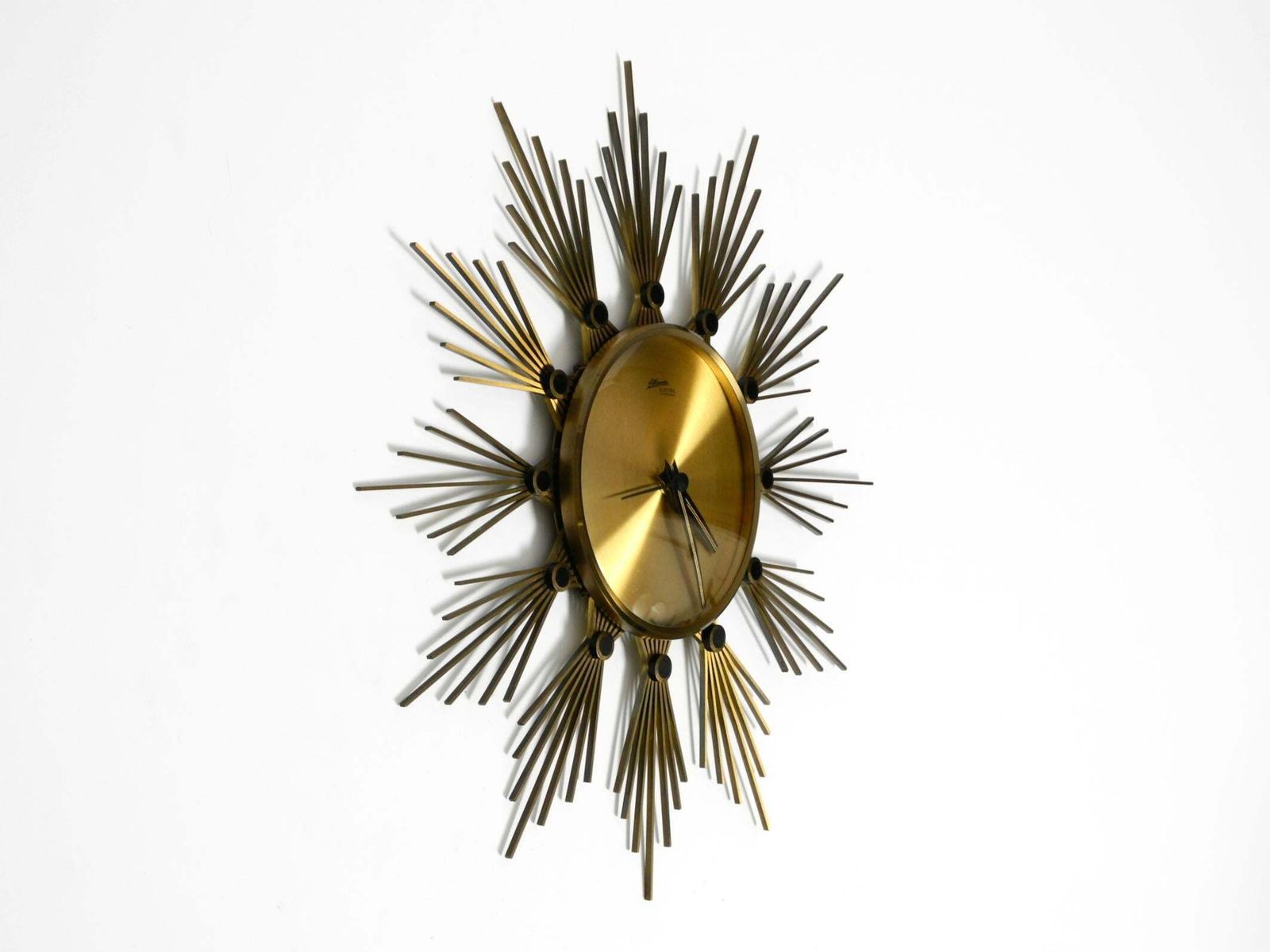 Original 1950s Sunburst Wall Clock By Atlanta Made Of Brass And Battery Operated photo for sale