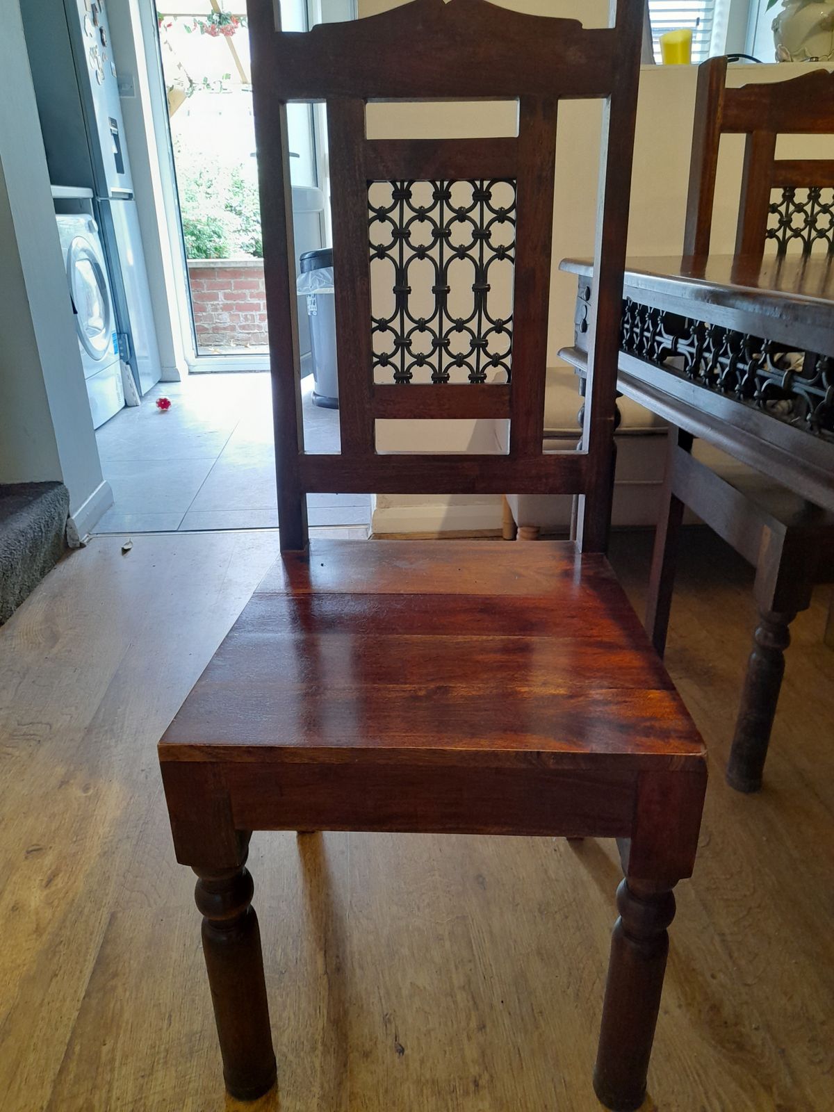 Dark Wood Table And 4 Chairs With Gothic Metal Inlay photo furniture
