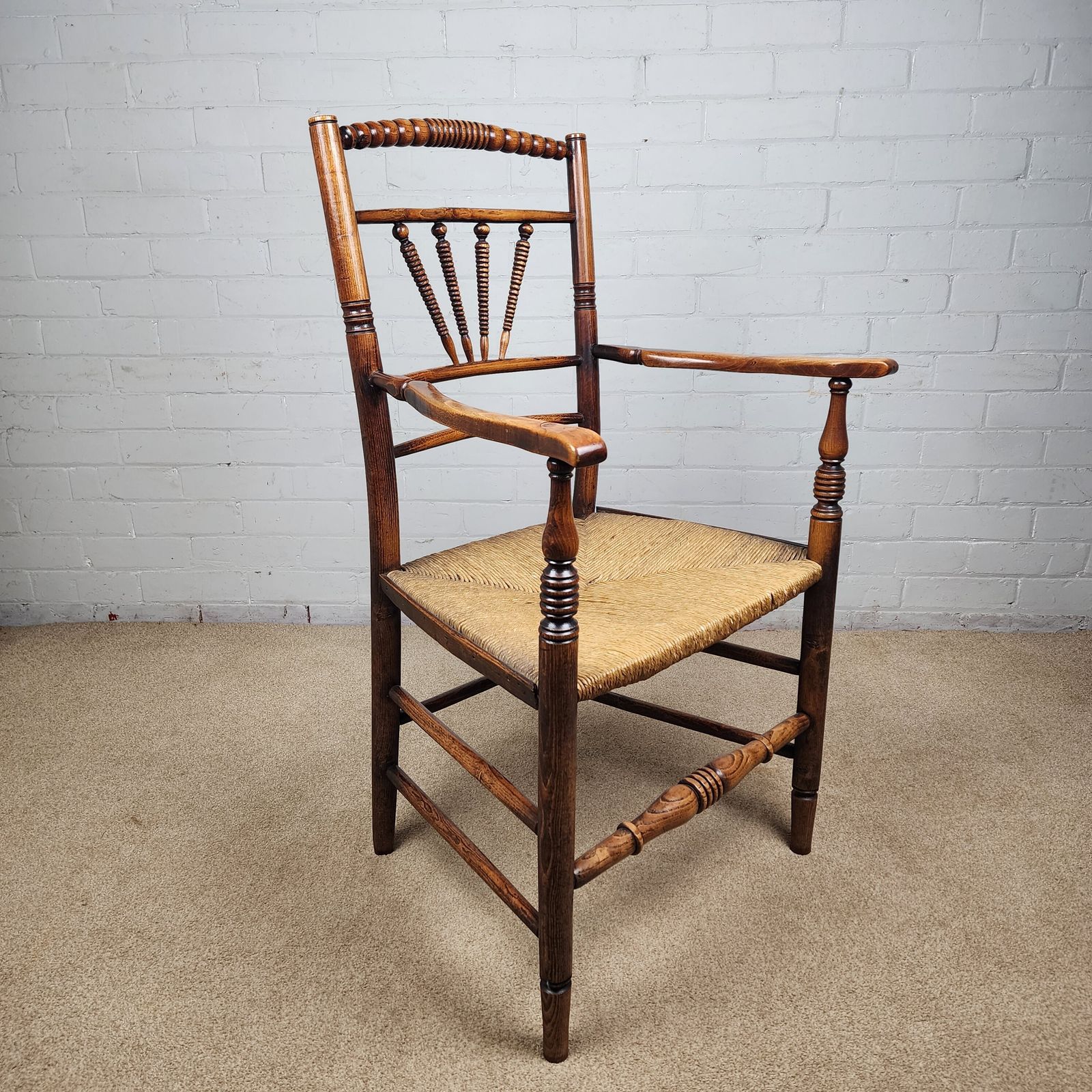 photo for sale A George III Elm And Fruitwood Spindle Back Carver Chair