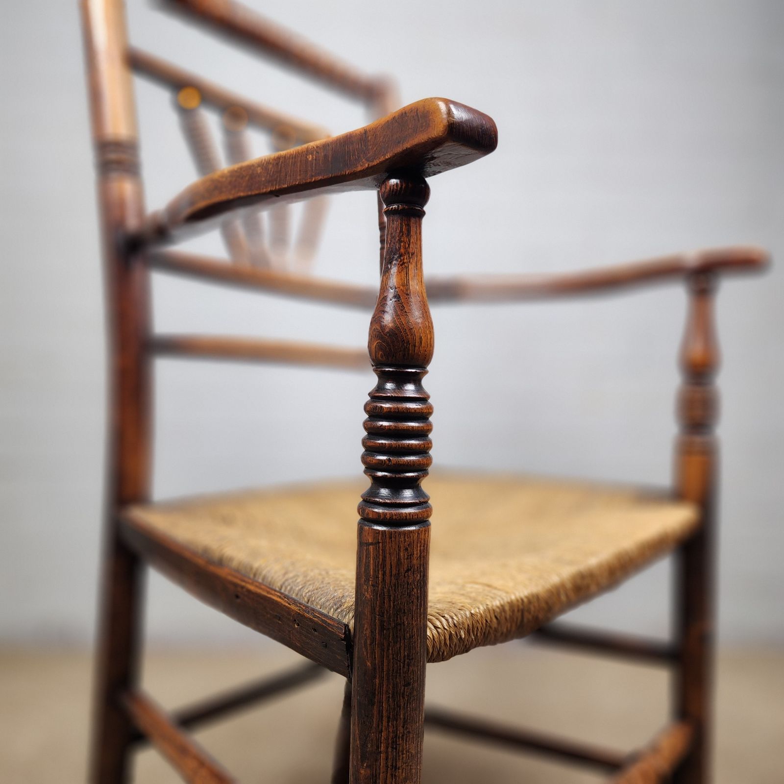photo buy A George III Elm And Fruitwood Spindle Back Carver Chair
