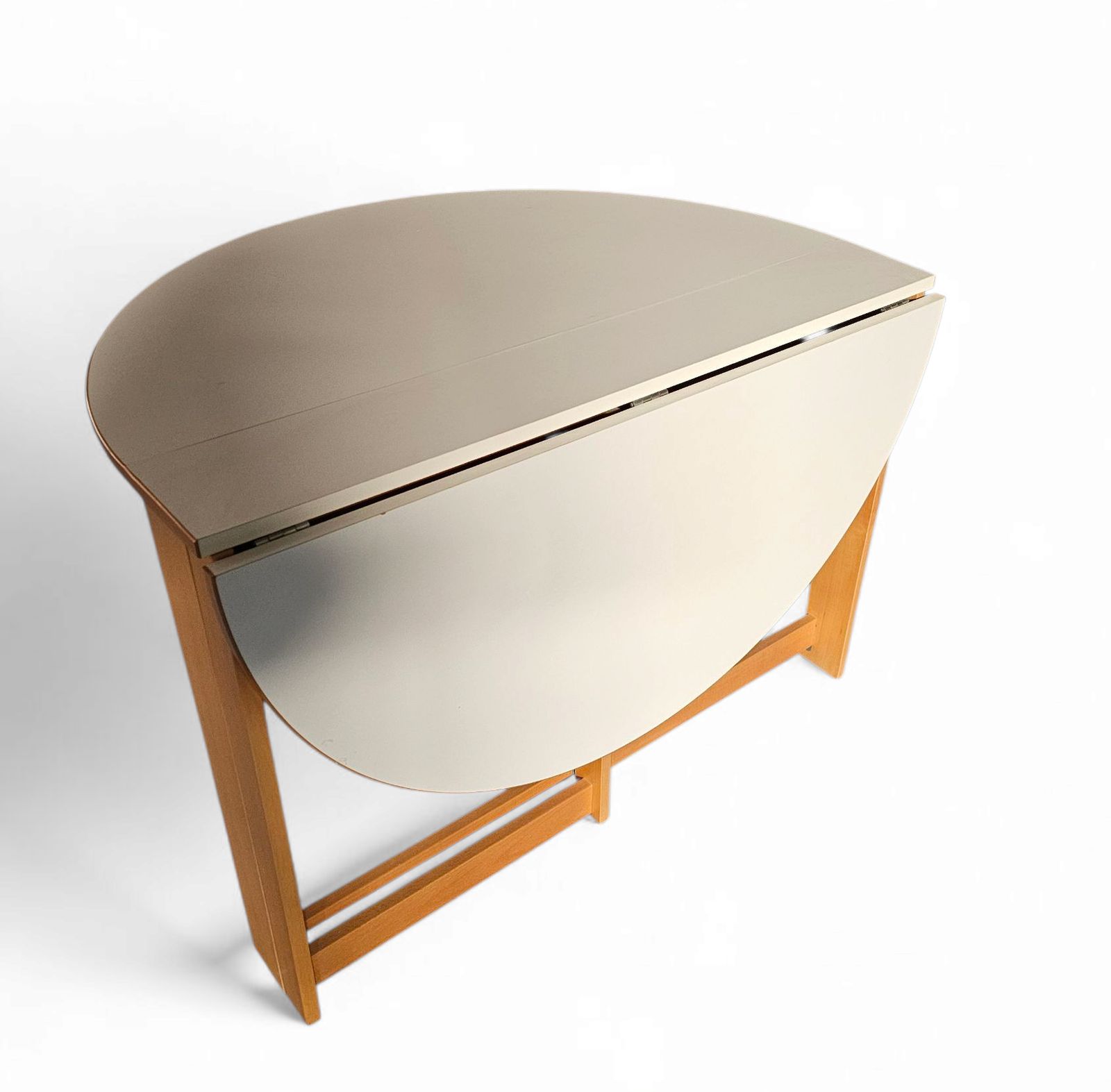 Vintage Scandinavian Folding Dining Table With Side Leaves. The Oval Top Is Made Of White Formica photo for sale