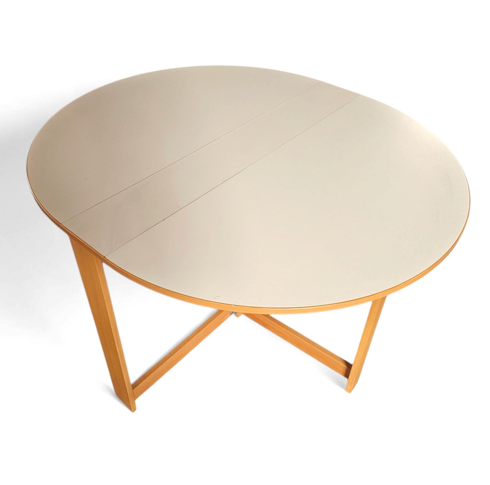 photo for sale Vintage Scandinavian Folding Dining Table With Side Leaves. The Oval Top Is Made Of White Formica