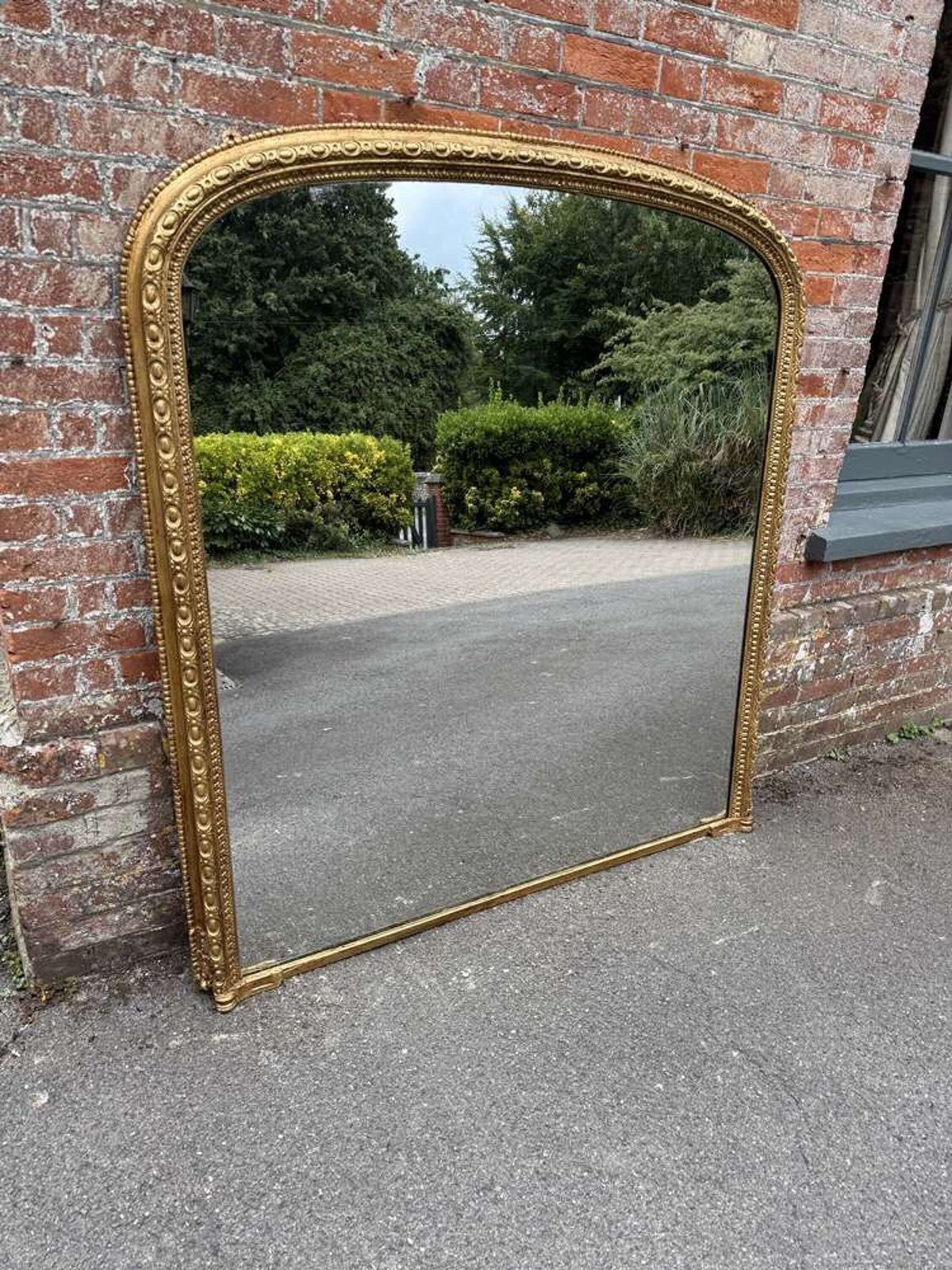 A Stunning Large Antique English 19th C Arched Gilt Overmantle Mirror.